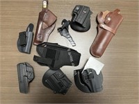 Various gun holsters