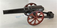 Antique toy cast-iron cannon measuring 16 inches