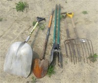 (2) Pitch forks, (2) shovels, post hole digger.