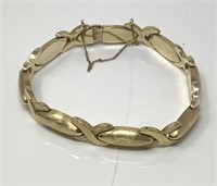 14 Kt. Gold X’s & Ovals Bracelet W/Safety Chain.