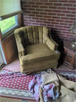 Vintage cushioned arm chair with cover