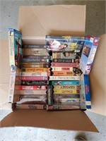 Big box full of VHS TAPES, lots of John Wayne,