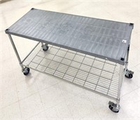 Amco rolling cart with a polymer top shelf