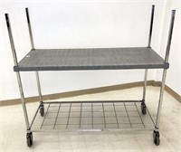 Amco two tier rolling cart. Top shelf
