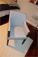 Cream upholstered wood nail head detail chair