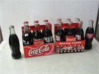 Two Six-Pak of Coca-Cola Bottles Plus
