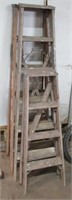 (3) Wooden step ladders. Sizes include (1) 4' (2)
