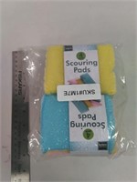 2 four packs of scouring pads