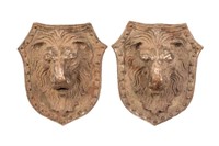 PAIR OF ANTIQUE CAST IRON LION HEAD SHIELDS