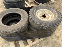 4 USED TIRES, 2 ARE ON RIMS