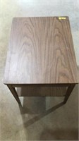 End table approximately 26 inches long and