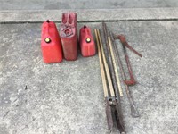 3 gas cans, post hole digger, fence stretcher