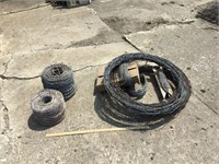 Rolls of barbed wire fencing