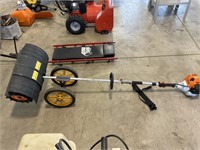 Stihl gas power unit with lawn sweep attachment