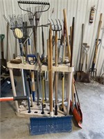 Miscellaneous garden tools with holder, rakes,