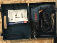Bosch electric hammer drill in case