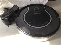 Robotic vacuum Shark with charger