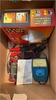 Box lot with 2 volt meters and a clamp on lamp
