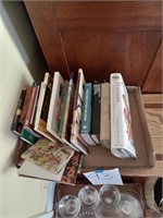Flat of various field guide books