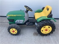 Childs green pedal tractor