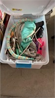Tote of baby items and hangers