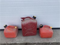 One medium and two small gas cans