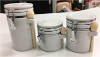 3 White Ceramic Canisters w/Wooden Spoons