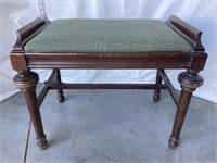 Green upholstered top wood bench