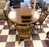 Dining room table w/matching chairs 2 leaves