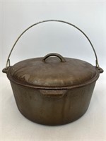 Large cast-iron pot with lid