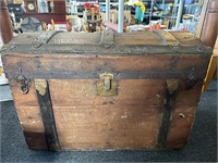 Antique wooden Camelback trunk