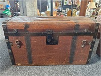Antique rolling wooden trunk