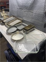 Quantity of cake pans, including two glass Pyrex