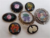 7 OLDER BROOCHES, HAND PAINTED ENAMEL INTAGLIO