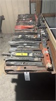 LARGE TABLE OF ASSORTED NEW MOWER BLADES