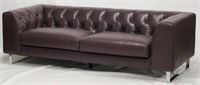 Contemporary chrome base leather Chesterfield sofa
