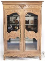Ornately carved double door large cabinet