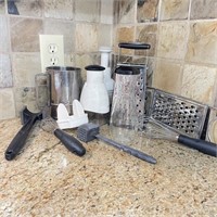 Shelf of Kitchen Items Right of Sink Over DW