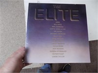 USED LP  THE ELITE MIXED  RECORD IS AS SHOWN,