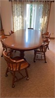 Dining table, 6 chairs, and 3 extensions