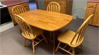 Honey blonde tone wood table w/ 4 chairs