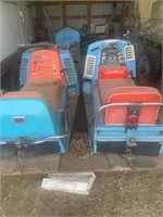 Two Blue Snowmobiles (condition unknown)