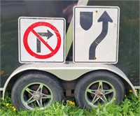 TWO METAL DIRECTIONAL ROAD SIGNS