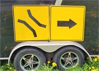 TWO LARGE METAL DIRECTIONAL TRAFFIC SIGNS