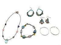 Three Pairs Earring, a Bracelet, and a Necklace