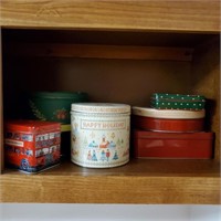 Lot of Small Tins in Cabinet