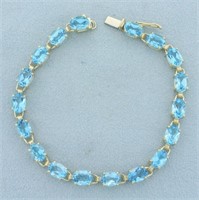 Swiss Blue Topaz Tennis Line Bracelet in 10k Yello