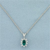 Emerald and Diamond Halo Pendant on Chain in 14k W
