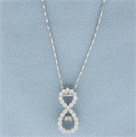 Infinity Design Dancing Diamond Necklace in 14k Wh