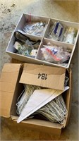 Box of wire hangers and baggies supplies for kid